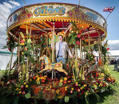 Mig Kimpton with Floral Carousel at Blenheim - flower shows Mig Kimpton with Floral Carousel at Blenheim - flower shows
