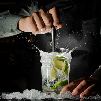 Bartender making a cocktail Bartender making a cocktail